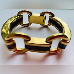 Michael Kors tortoiseshell gold bracelet with snap closure